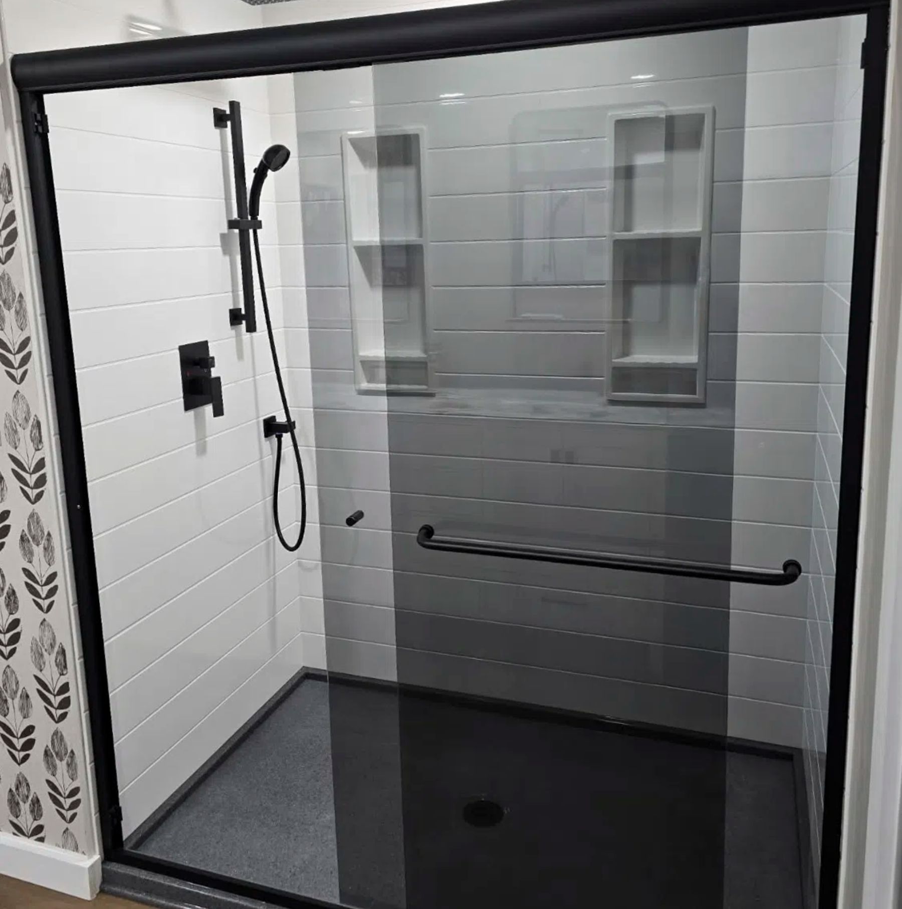 Recessed shower shelf and premium shower wall surface detail