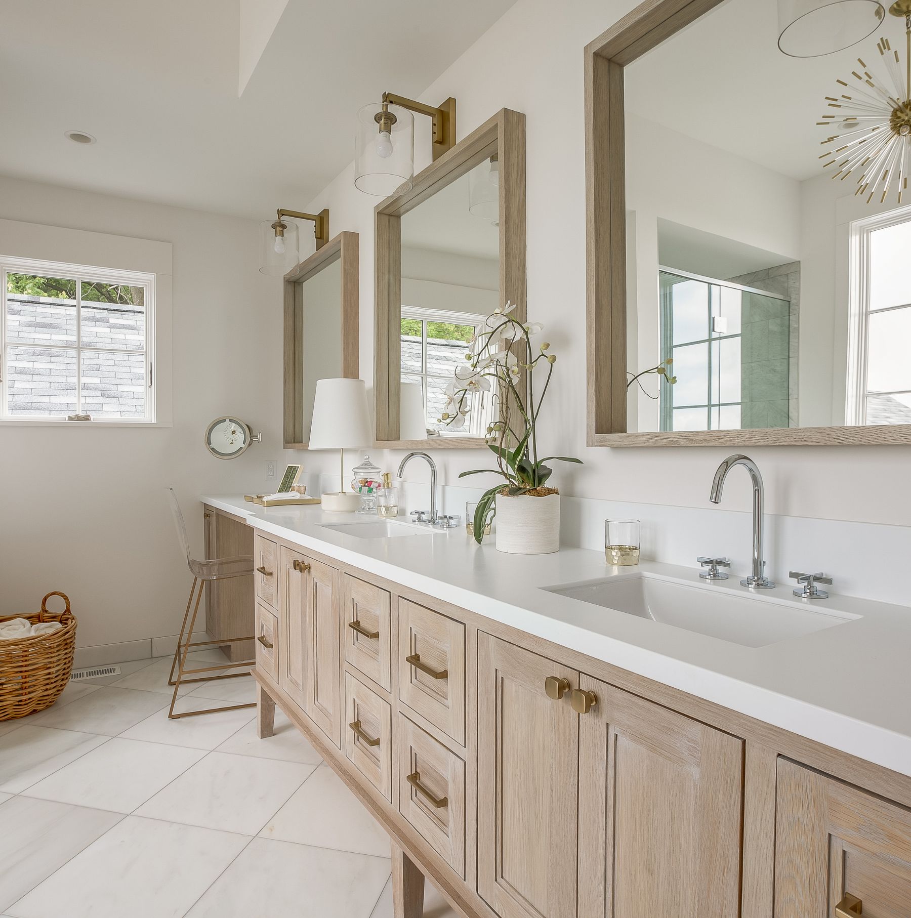 Double bathroom vanity with custom cabinetry and premium countertop