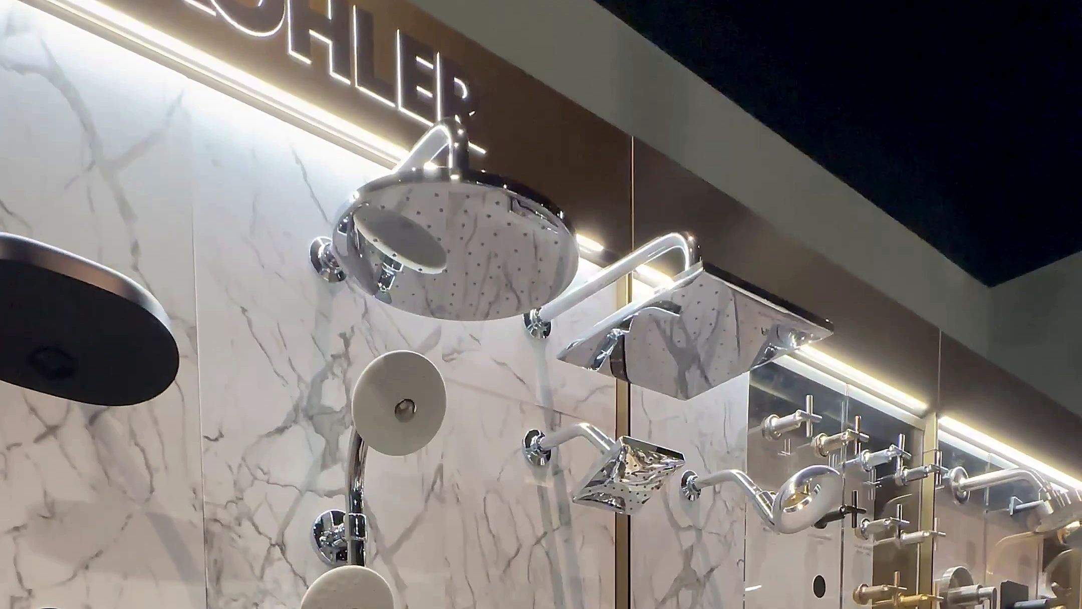 Homeowners reviewing bathroom product selections in a Springfield showroom